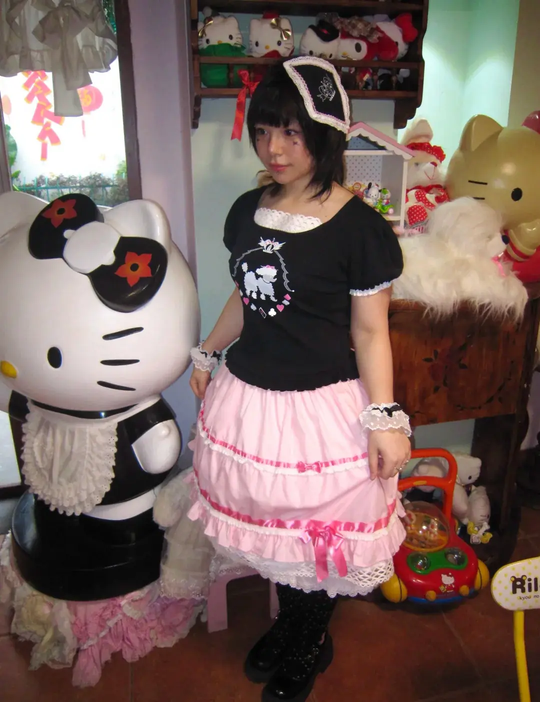 Poodle Poker, black top, pink skirt